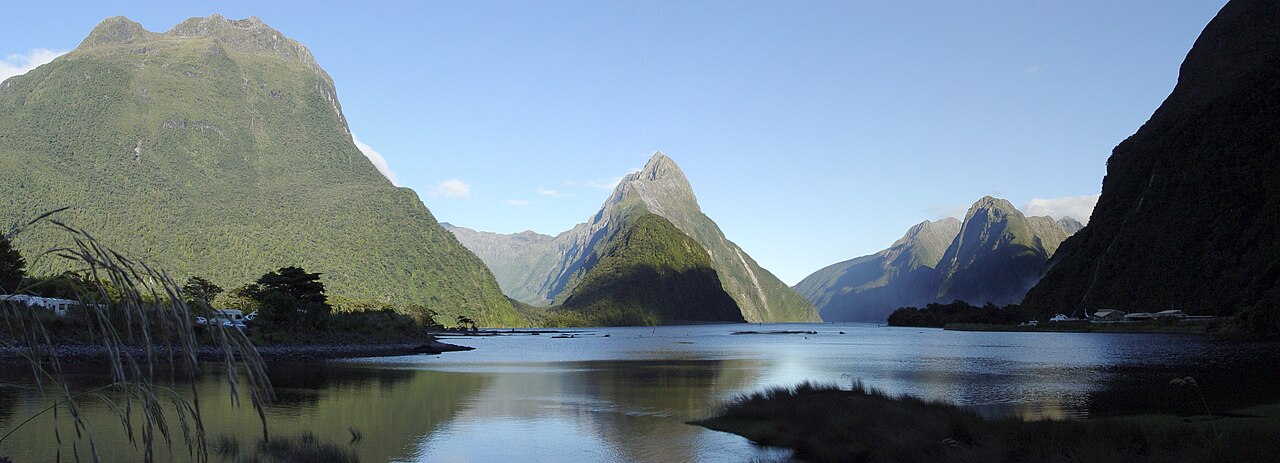 Milford Sound featuring Mitre Peak rising dramatically from the fiord water with lush green mountains